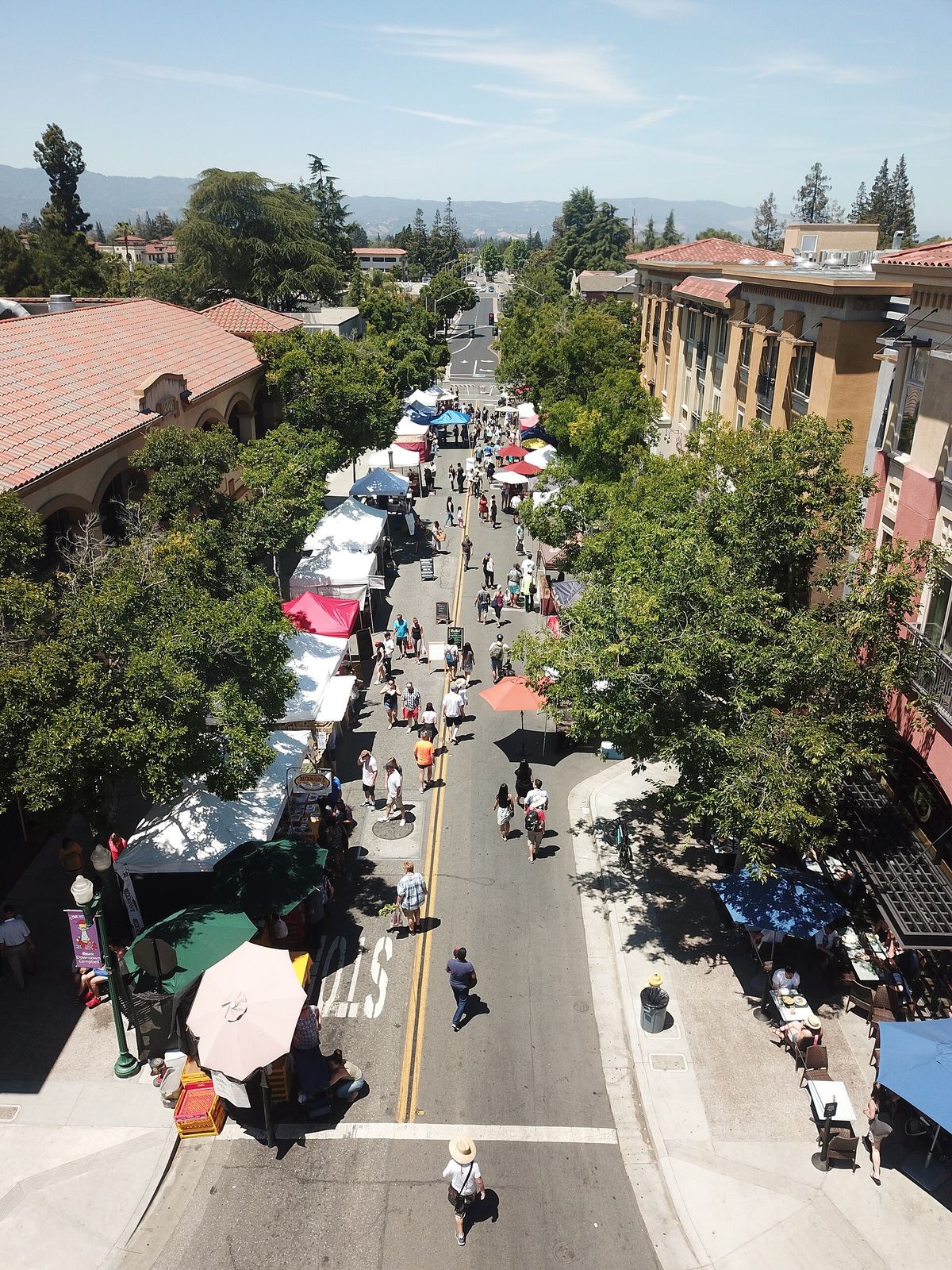The Sunday farmers' market filling East Campbell Avenue, seen from above